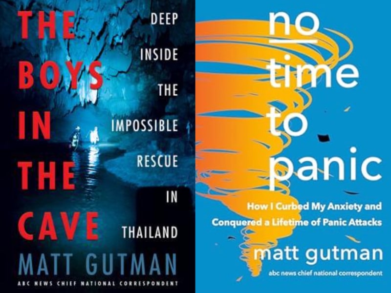 From left to right are Matt Gutman's books "The Boys in the Cave: Deep Inside the Impossible Rescue in Thailand," "No Time to Panic